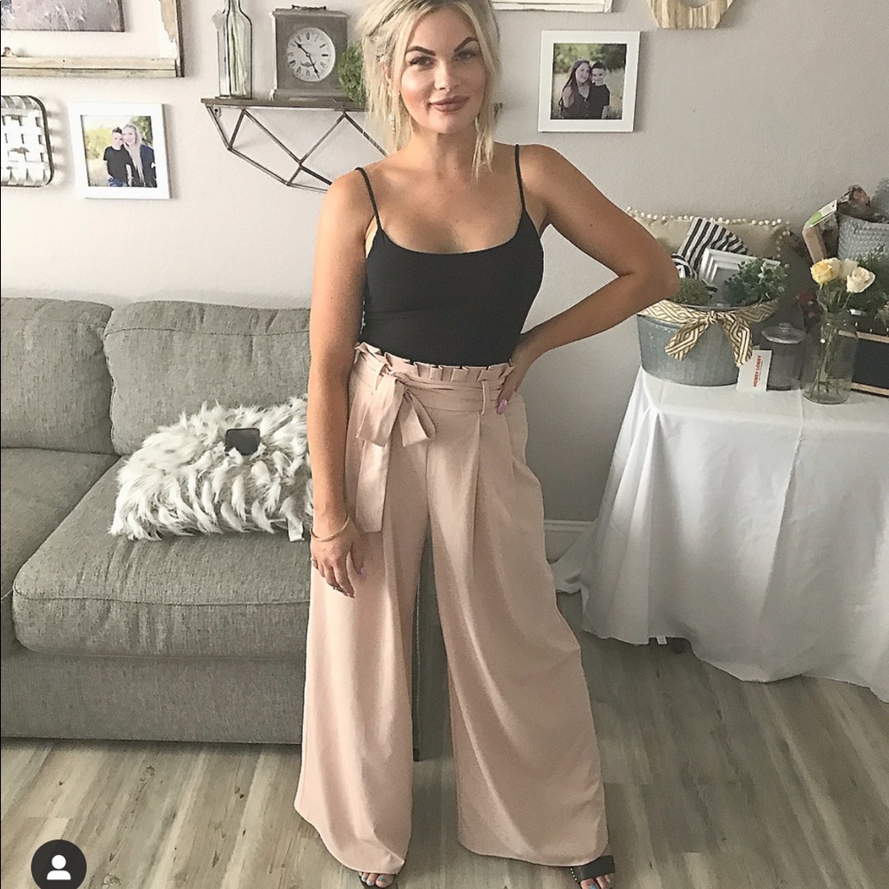 Adorable mauve pants with bow accent!